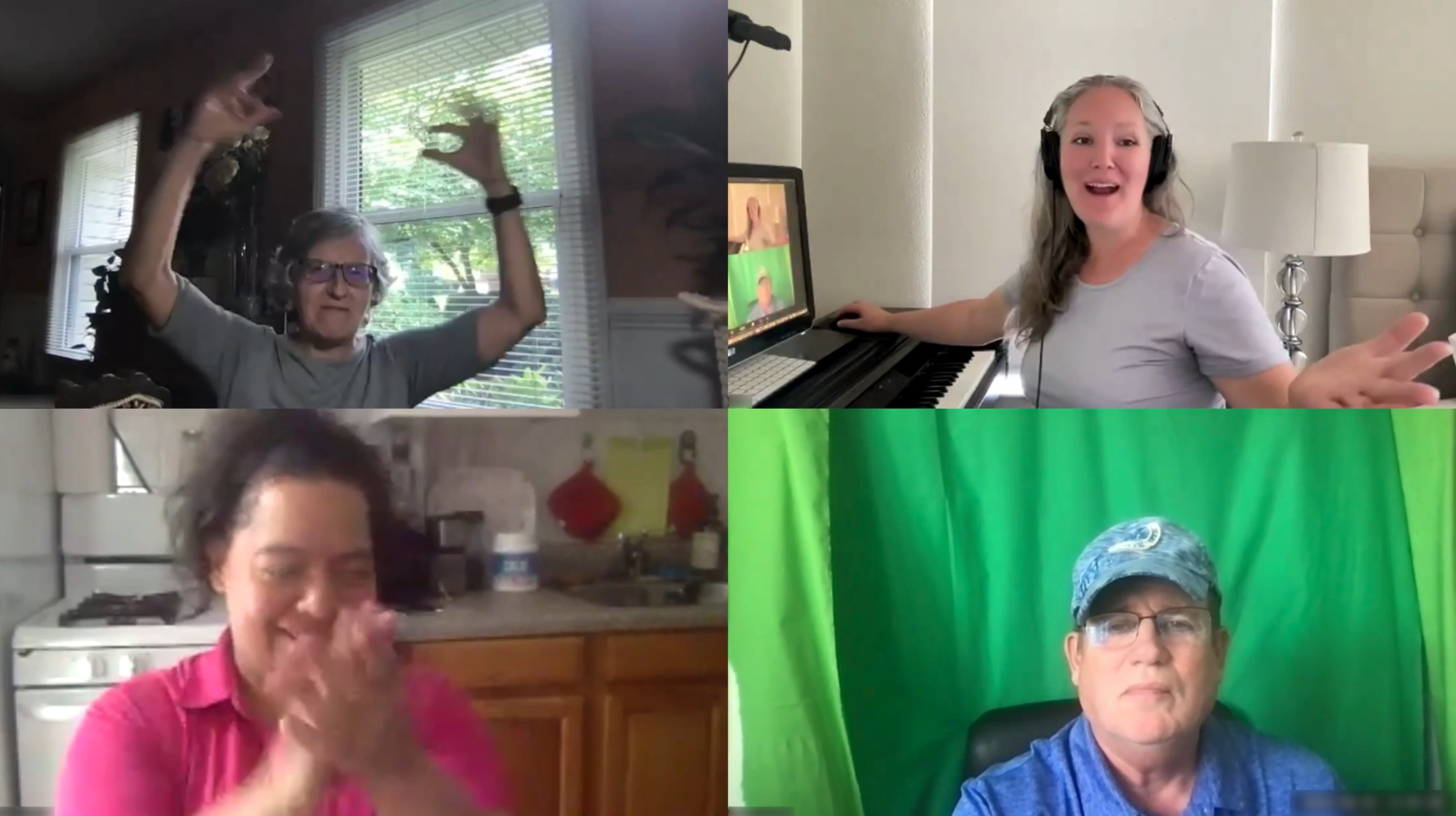 Screenshot 2025-08-01 at 3.32.16 PM Four adults participate in a virtual piano class on Zoom. One woman claps in her kitchen, another smiles while teaching at a digital piano, a man sits in front of a green screen, and another woman raises her arms in excitement in a well-lit room.